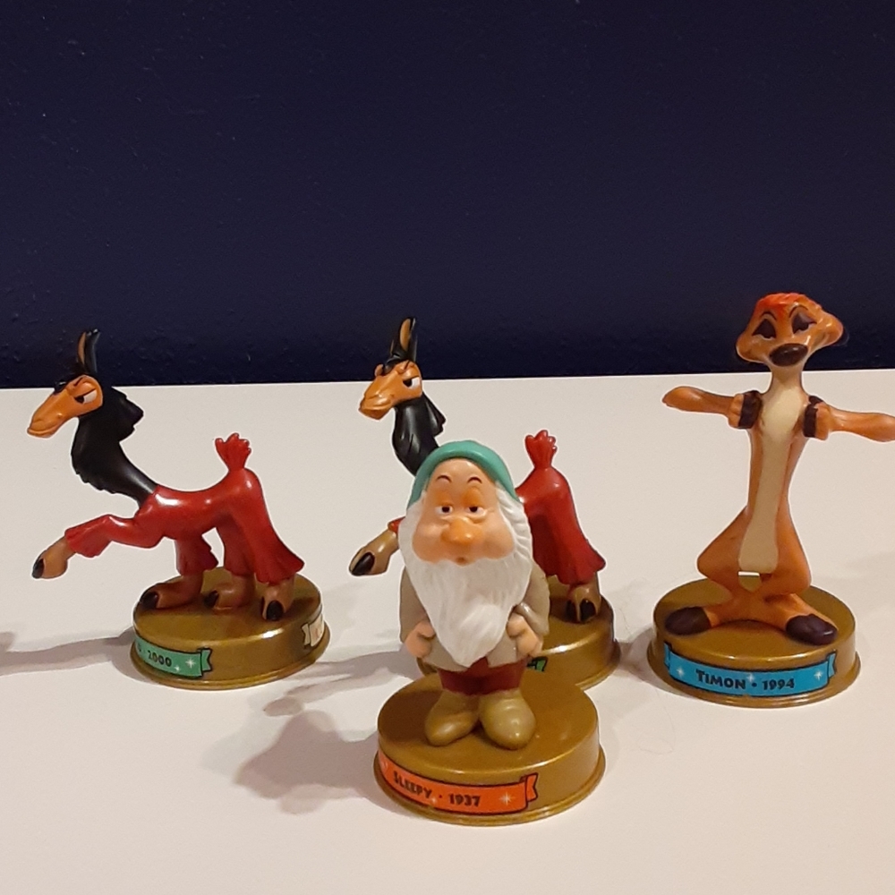 4 collectable 2002 McDonald's figures